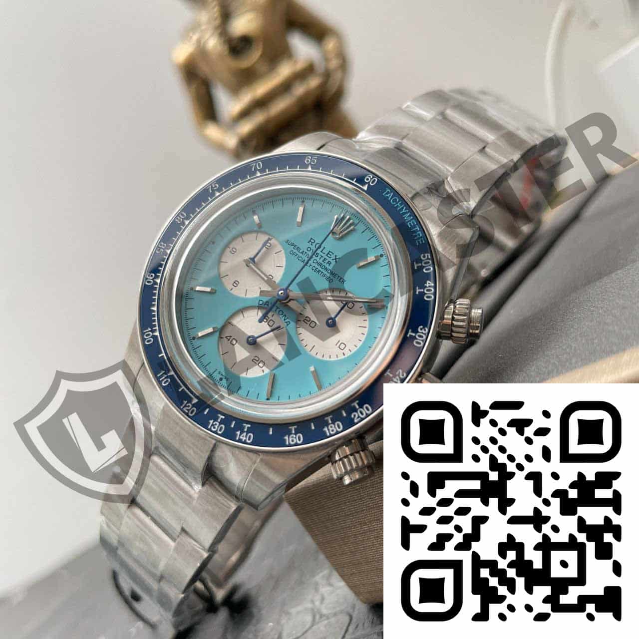 a silver watch with blue face