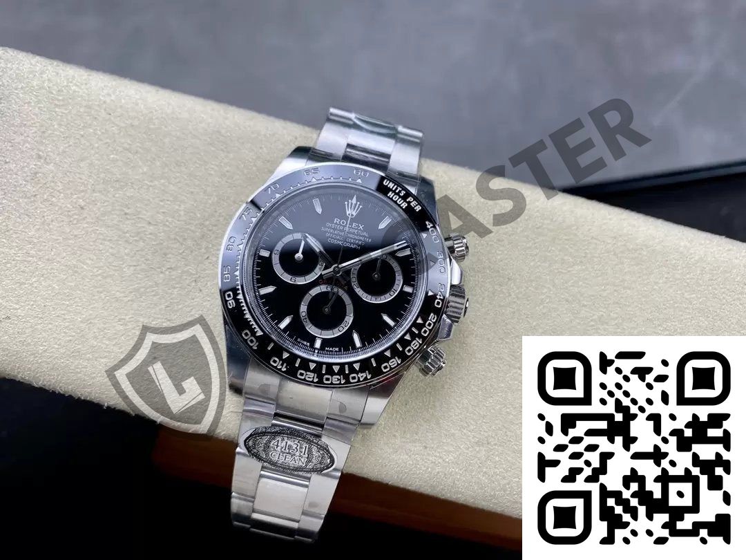 a silver watch with a black face