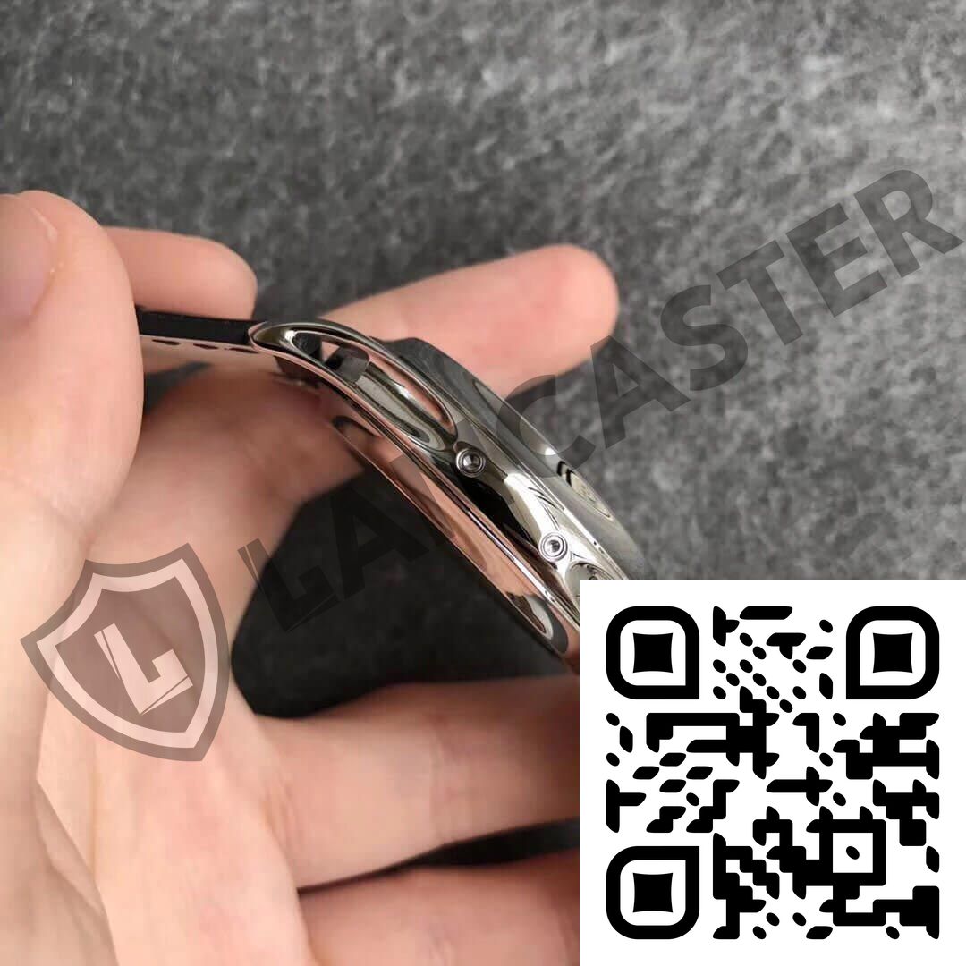 a hand holding a watch