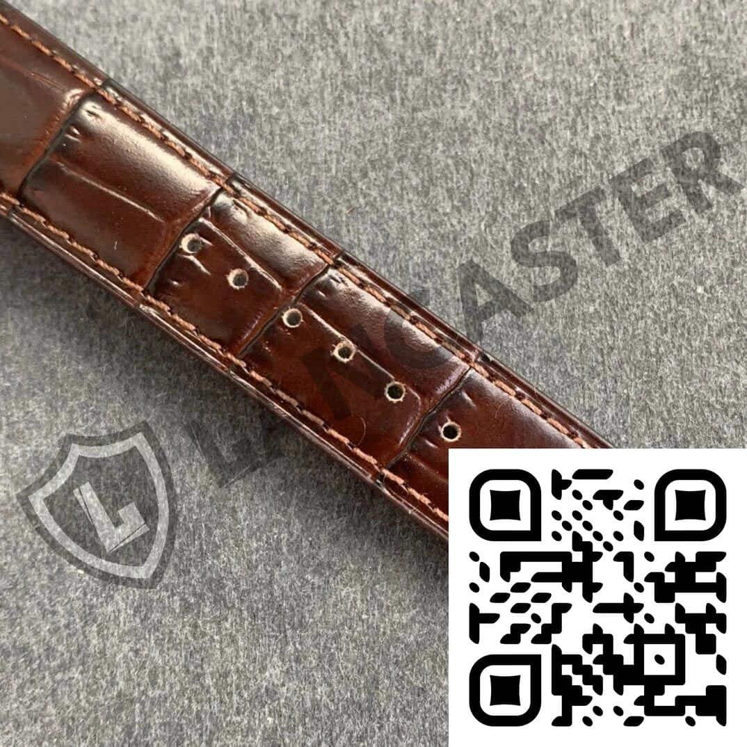 a brown leather strap with a qr code