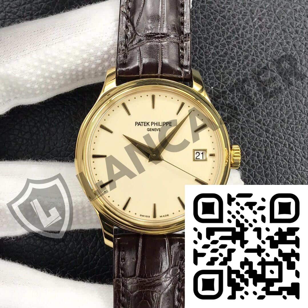 a gold watch with a brown leather strap